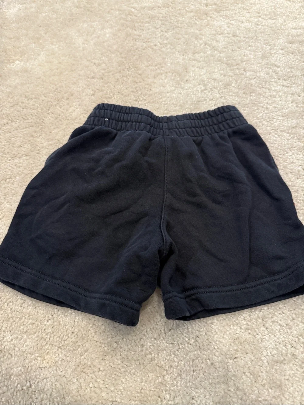 Nike Black Girl’s Athletic Shorts with White Logo size small drawstring pockets